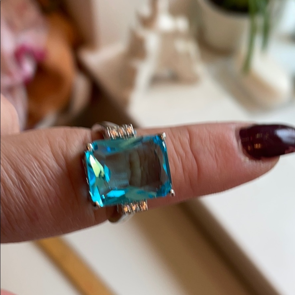 Ring with blue stone